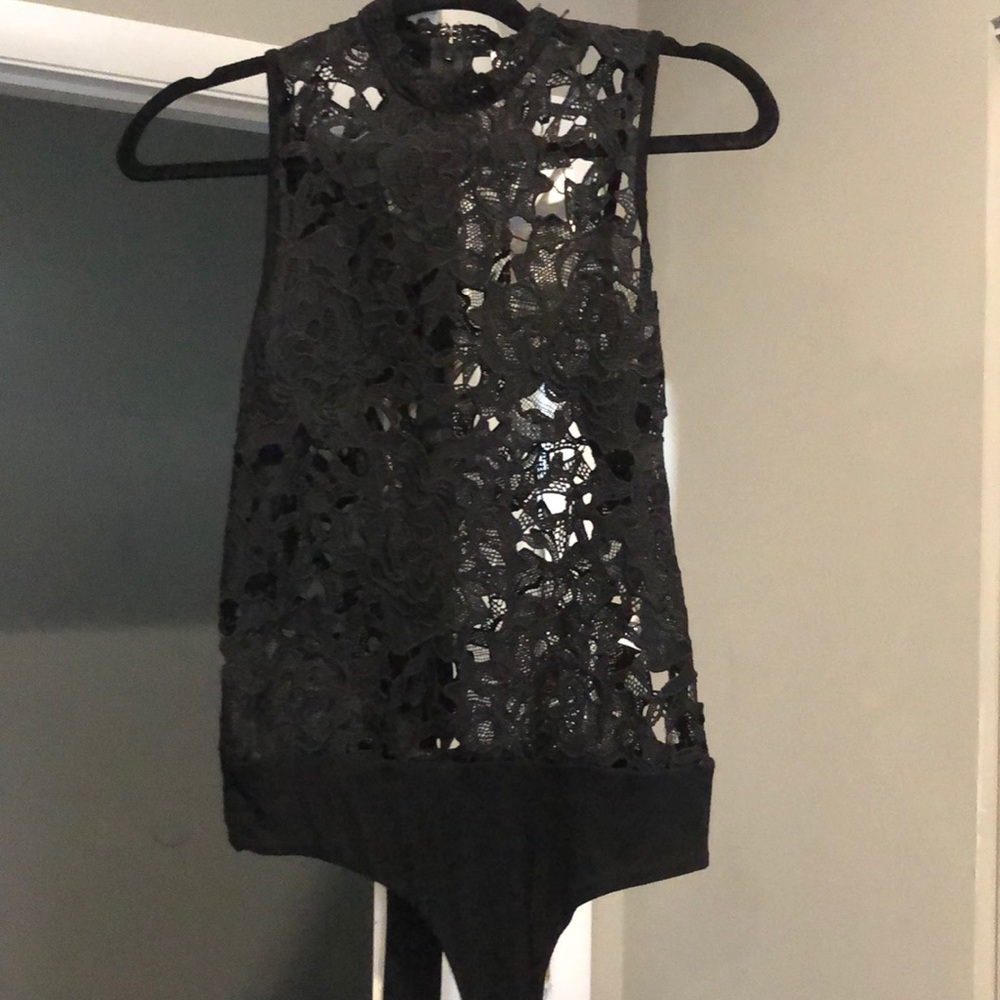 NWT- lace one piece. Perfect condition